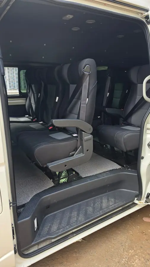 Executive seats fitted in rows inside a van