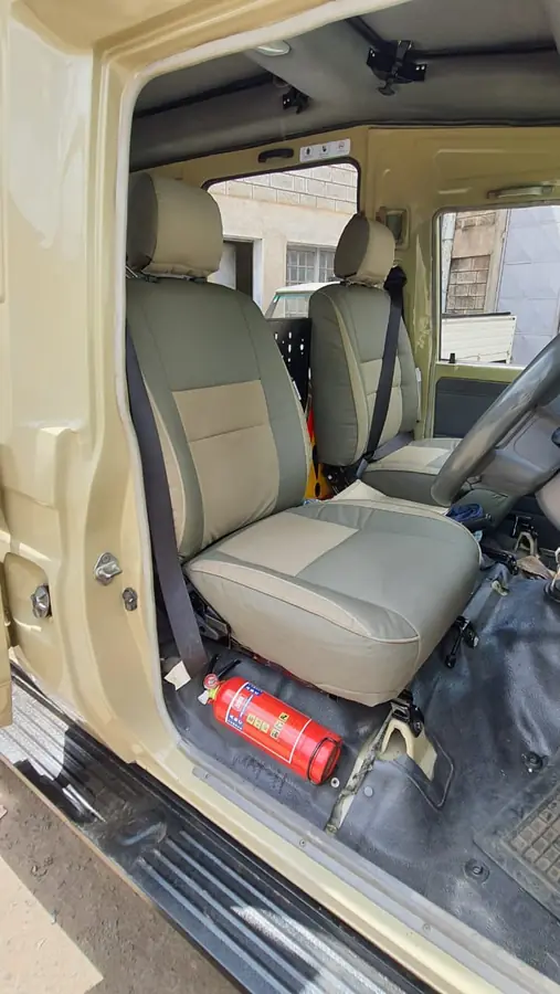Two-tone Land Cruiser seats fitted in the cab