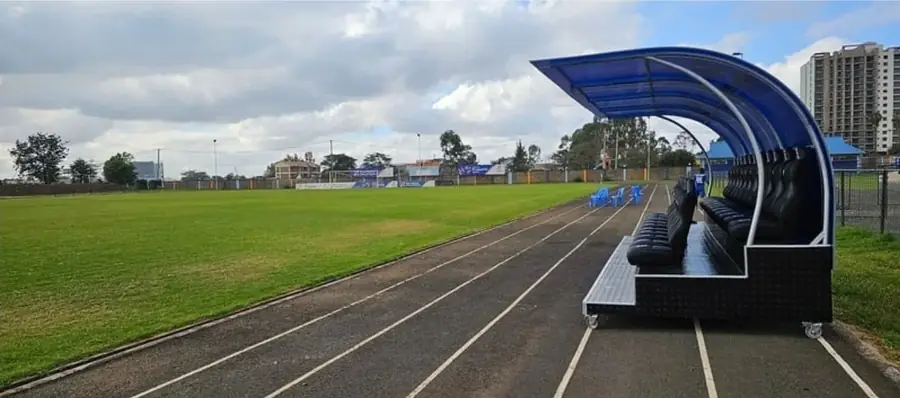 Team dugout at the edge of a sports ground