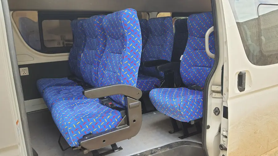 Blue patterned standard seats fitted in a van