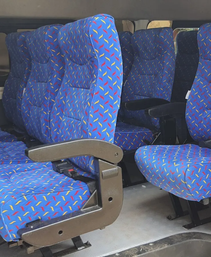 Blue patterned standard seats fitted in a van