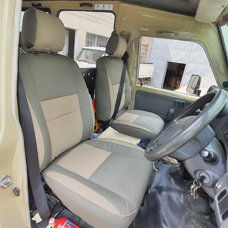 Two-tone seats fitted in a Land Cruiser cab